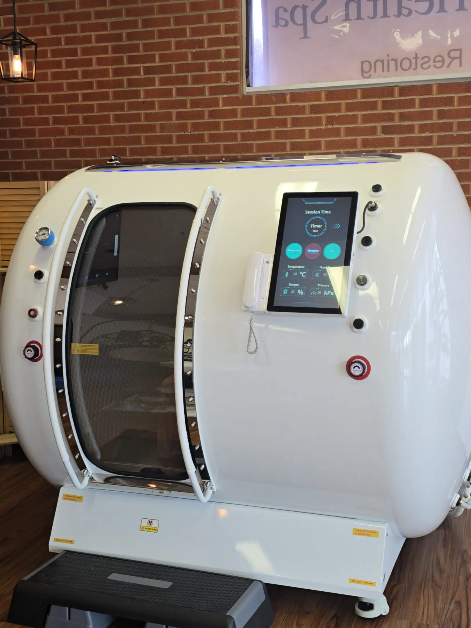 White spa therapy pod with touchscreen